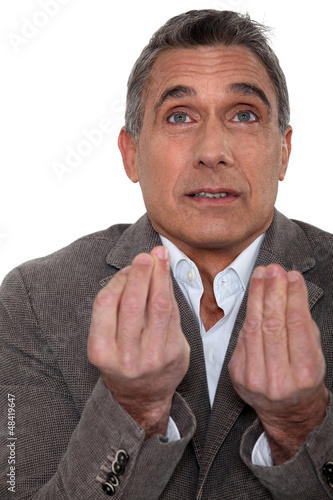 Photo: Senior businessman asking question Senior businessman asking question