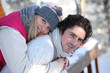 Photo: Couple stood on chalet decking Couple stood on chalet decking