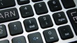 Learn & Lead. Tracking shot of keyboard keys LEARN and LEAD.
