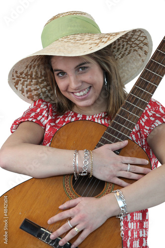 Photo: Cheerful woman holding a guitar Cheerful woman holding a guitar