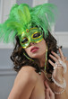 The beautiful young girl in a mysterious mask