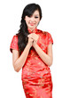 pretty girl with cheongsam wishing you a happy Chinese new year