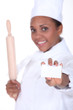 Chef with rolling pin and business card