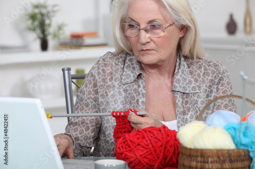 Photo: Elderly woman knitting Elderly woman knitting