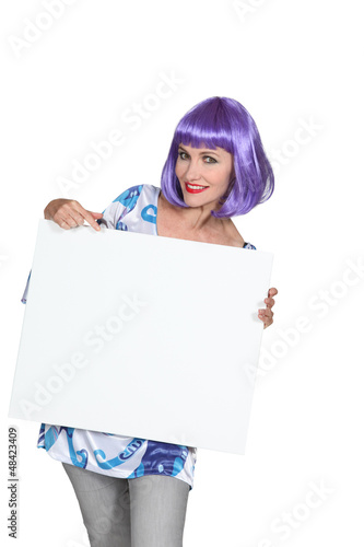 Photo: Woman wearing a wig Woman wearing a wig