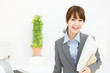 Beautiful young businesswoman working in office