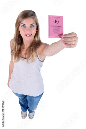 Photo: Young woman with a French drivers licence Young woman with a French drivers licence