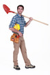 Manual worker holding shovel