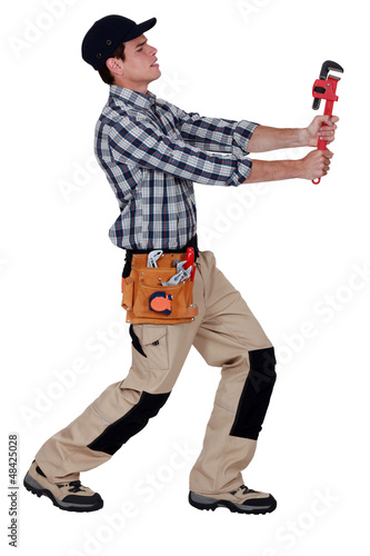 Photo: Tradesman being dragged Tradesman being dragged