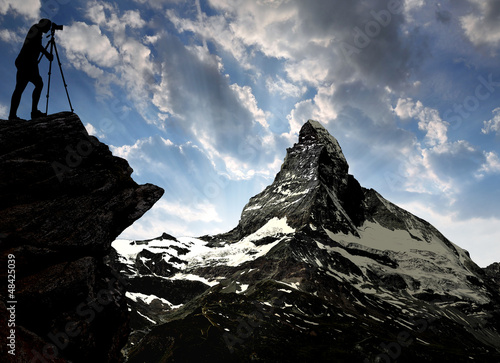 Photo: photographer taking a picture the sunset over the Matterhorn photographer taking a picture the sunset over the Matterhorn