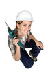Attractive female construction worker