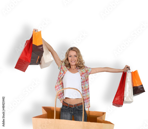 Photo: shopping addict in a shopping bag shopping addict in a shopping bag