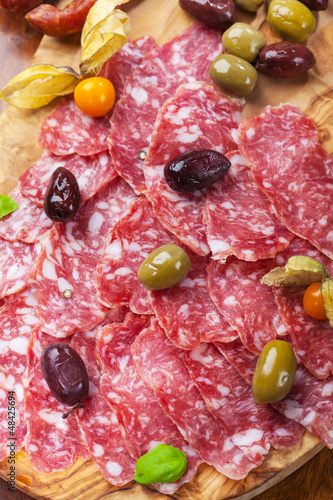 Photo: Traditional Italian salami with olives Traditional Italian salami with olives