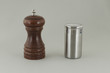 Two pepper shakers.