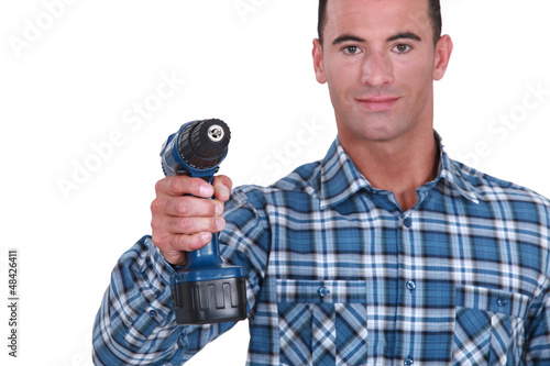 Photo: craftsman holding a drill craftsman holding a drill