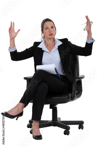 Photo: Female explaining measures of an object Female explaining measures of an object