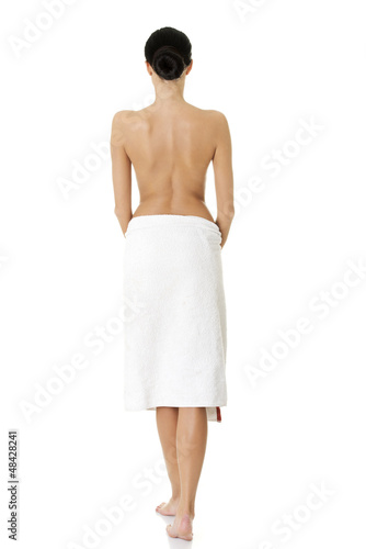 Photo: Young beautiful nude woman with towel Young beautiful nude woman with towel