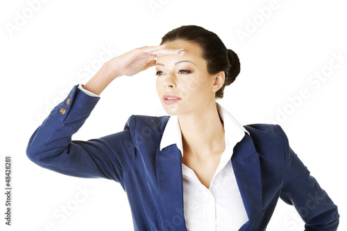 Photo: Business woman looking away Business woman looking away
