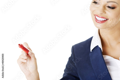 Photo: Writing with a pen on abstract screen Writing with a pen on abstract screen