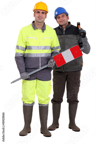 Photo: full-length portrait of bricklayer and carpenter full-length portrait of bricklayer and carpenter