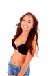 Photo: Beautiful young woman dressing bikini and shorts Beautiful young woman dressing bikini and shorts