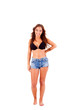 Photo: Beautiful young woman dressing bikini and shorts Beautiful young woman dressing bikini and shorts