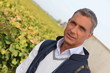 Photo: Farmer in vineyard Farmer in vineyard