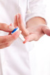 Diabetes patient measuring glucose level blood test