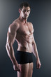 Photo: Portrait of a young muscular man in underwear Portrait of a young muscular man in underwear