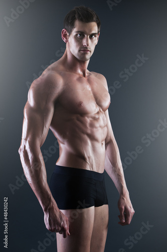 Photo: Portrait of a young muscular man in underwear Portrait of a young muscular man in underwear