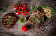 Grilled bbq steaks with fresh herbs and tomatoes
