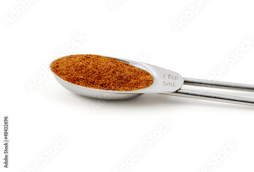 Photo: Chinese five spice measured in a metal teaspoon Chinese five spice measured in a metal teaspoon