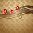 Beautiful three red diamond hearts and gold ornaments