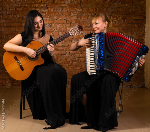 Photo: guitar and accordion performers guitar and accordion performers