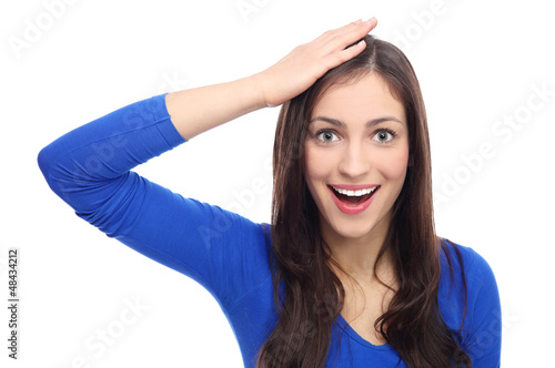 Photo: Shocked woman with hand on head Shocked woman with hand on head