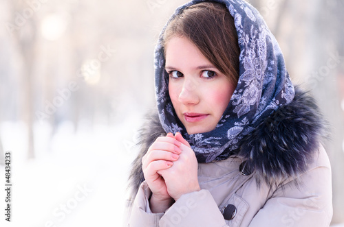 Photo: woman is warming up her hands woman is warming up her hands