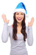Foto: Woman in Santa hat gesturing Woman in Santa hat gesturing