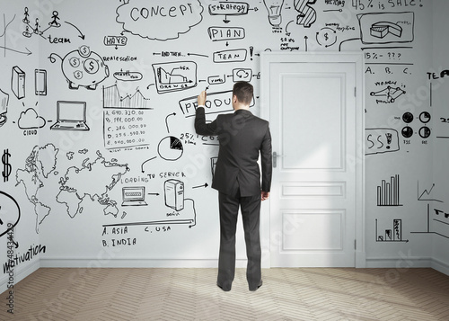 Photo: man drawing business plan man drawing business plan