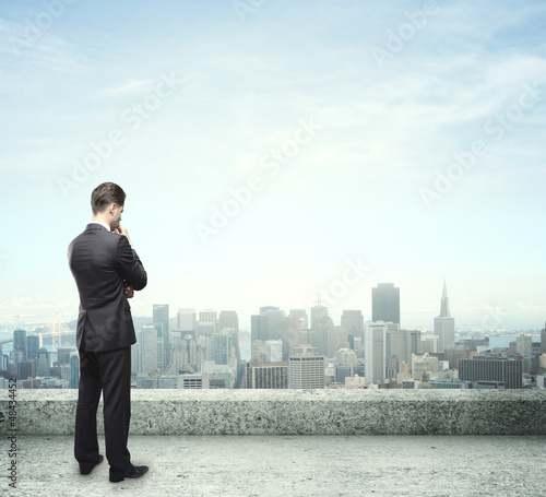 Photo: businessman and city businessman and city