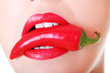 Beautiful woman with hot paprika