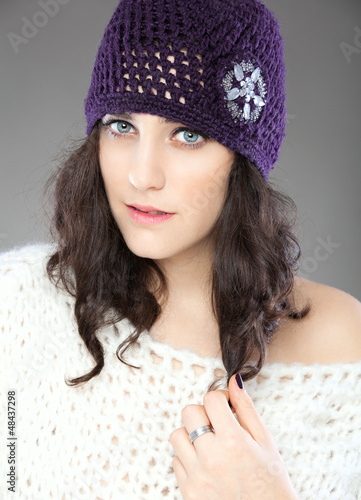 Photo: Beautiful young woman with knitted hat Beautiful young woman with knitted hat