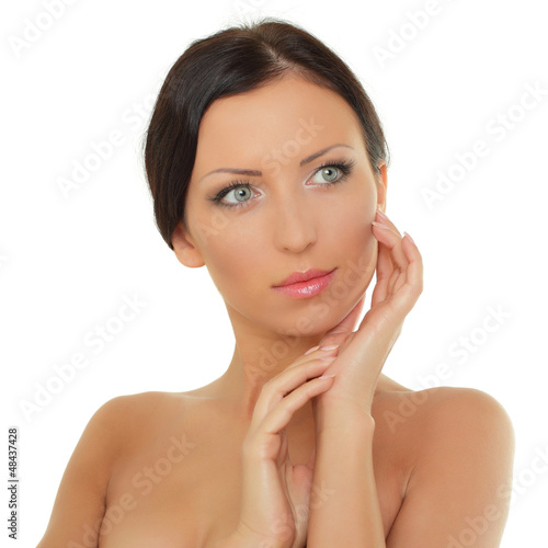 Photo: Beautiful woman face - isolated on white Beautiful woman face - isolated on white