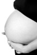 Photo: Mother to be holding her pregnant belly Mother to be holding her pregnant belly