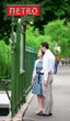 Beautiful couple near the metro station in Paris