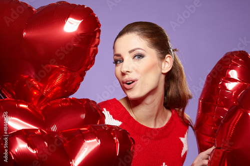 Photo: woman with red heart balloon woman with red heart balloon