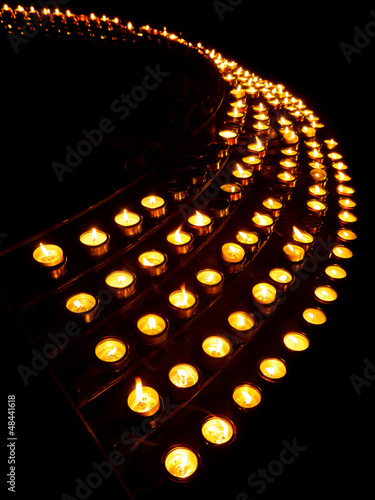 Photo: Rows of Prayer Candles in a Church Rows of Prayer Candles in a Church
