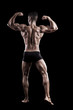 muscled man on a black background