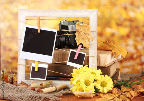 Photo: Autumnal composition with flowers, photo cards, wooden frame Autumnal composition with flowers, photo cards, wooden frame