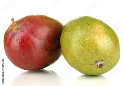 Photo: Ripe appetizing mango isolated on white Ripe appetizing mango isolated on white