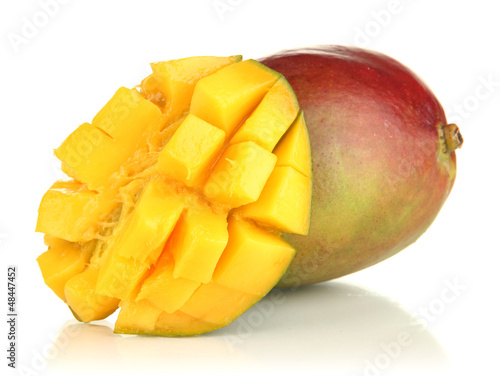 Photo: Ripe appetizing mango isolated on white Ripe appetizing mango isolated on white